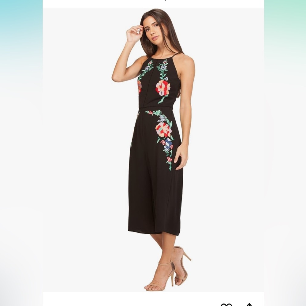 Adelyn Rae black jumpsuit with floral detail. Size Small. Excellent condition.